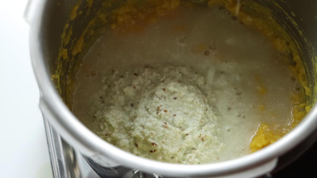 coconut-spice paste added to the cooked dal