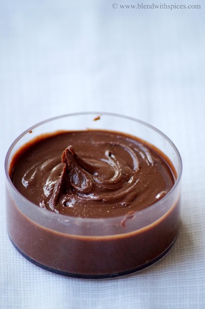creamy homemade vegan chocolate peanut butter in a glass bowl