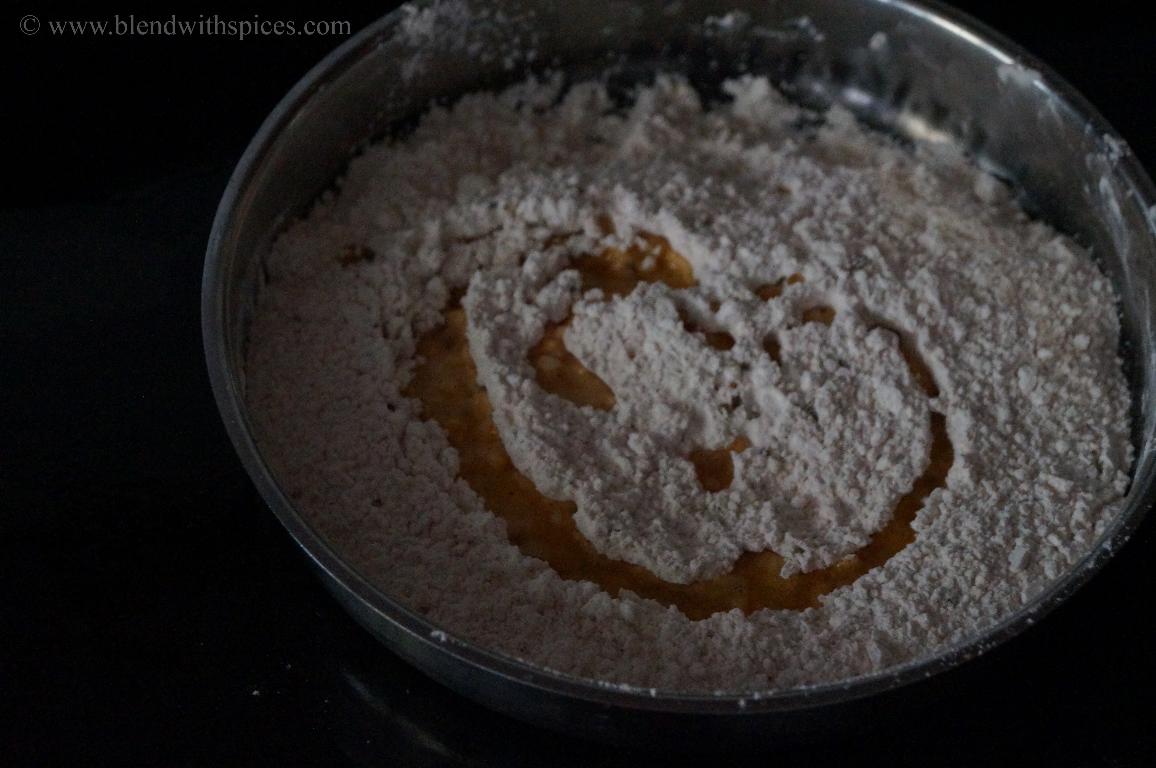 hot oil is added to the spiced rice flour mixture to prepare the dough
