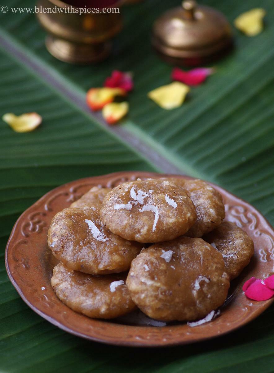 Traditional Andhra godhuma pindi kudumulu stacked on a plate and placed on a banana leaf.