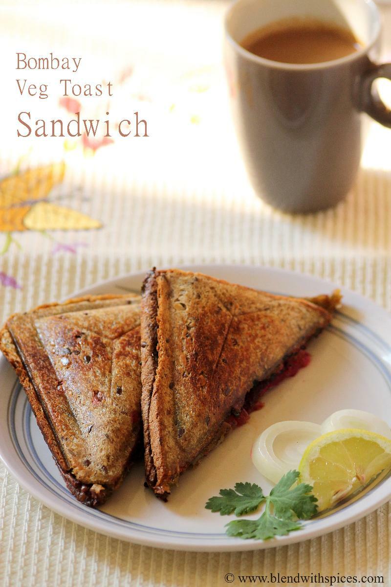Two pieces of Bombay grilled sandwiches served on plate along with a cup of tea.