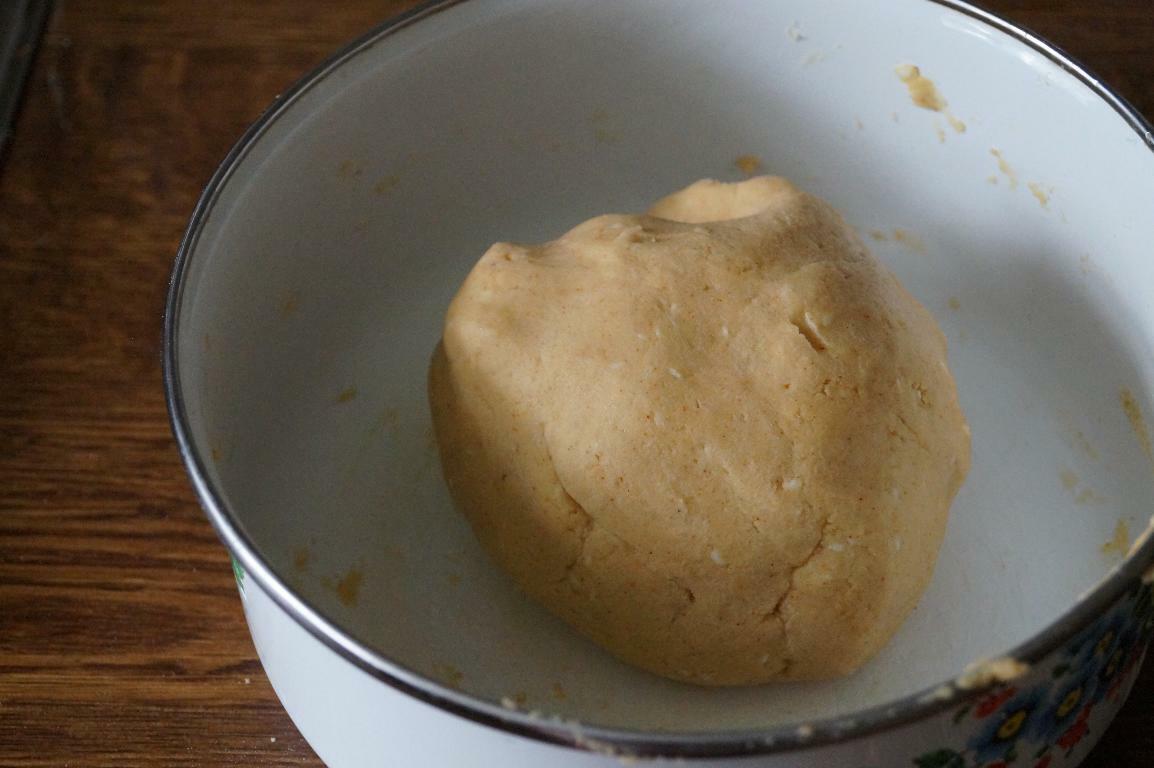 Smooth ribbon pakoda dough made with rice flour and besan, ready for pressing.