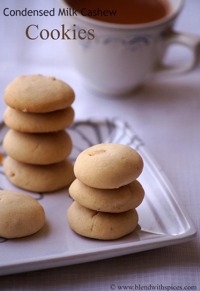 condensed milk cashew cookies served in a white plate with tea