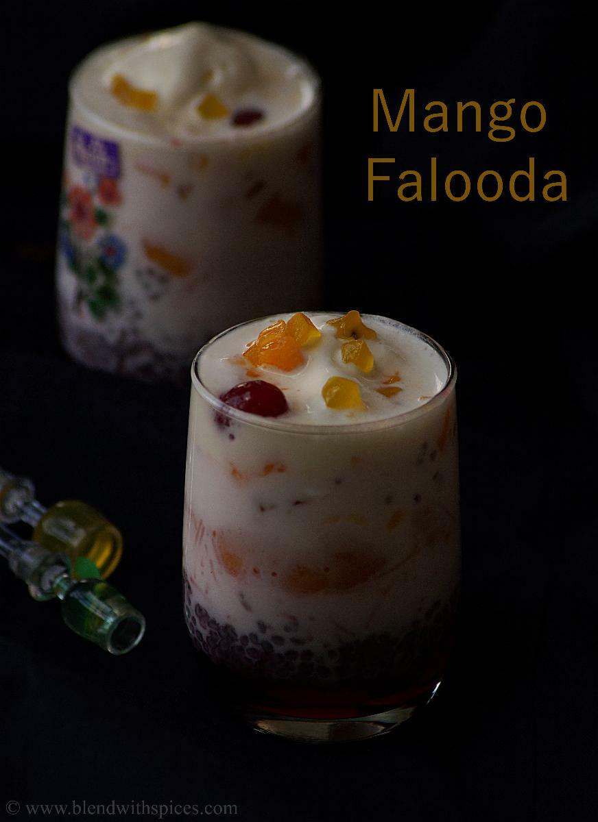 A classic Indian mango falooda served in a clear glass