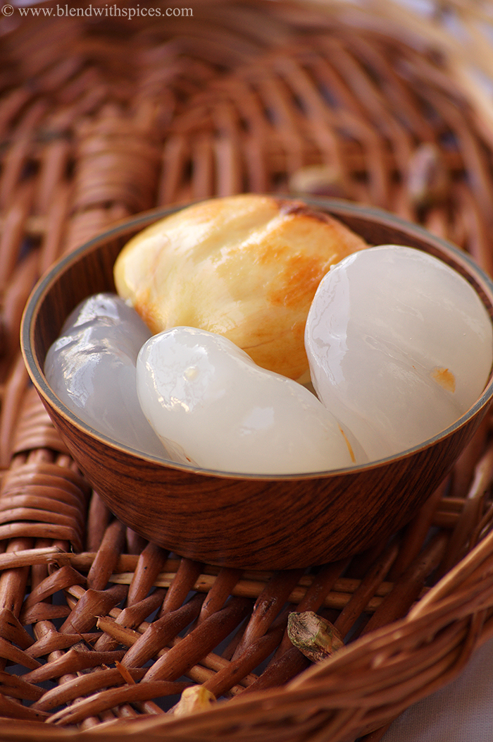 fresh ice apples or nugu or taati munjalu served in a wooden bowl