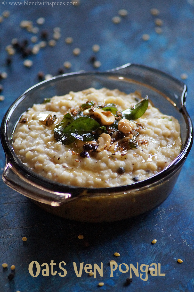 A bowl of healthy Indian oats pongal topped with ghee roasted spices