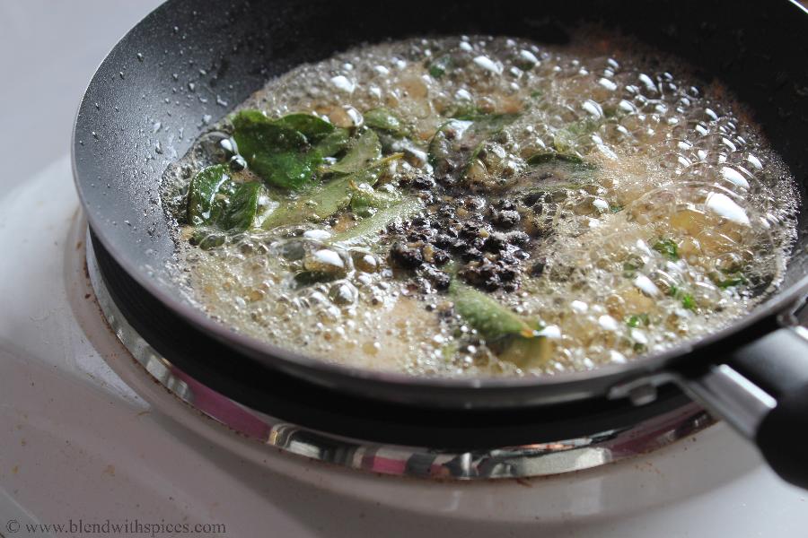 roasting spices in ghee to make healthy oats breakfast