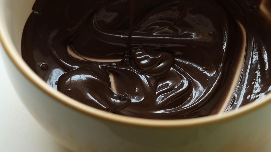 Melted chocolate in a bowl to make easter nests