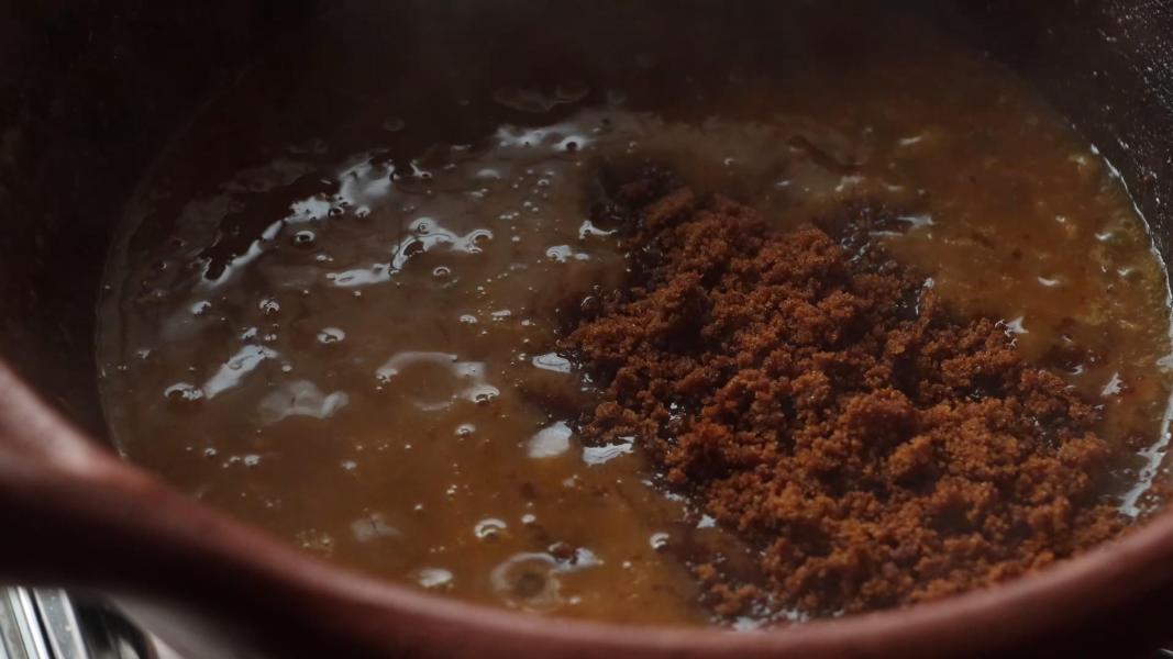 salt and jaggery added to the clay pot