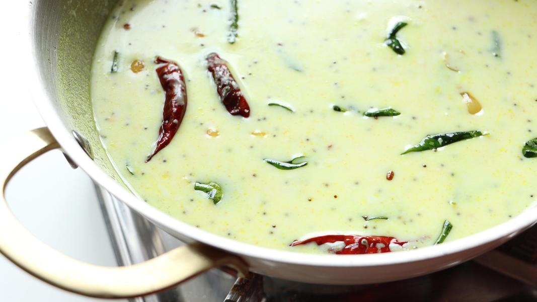 moru curry in a kadai