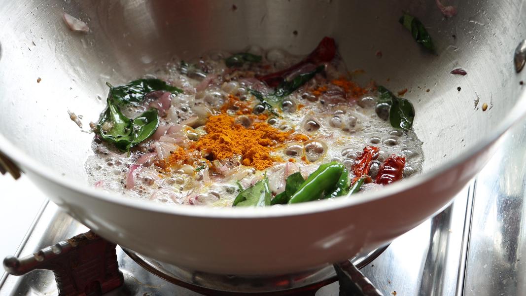 added turmeric powder to the roasted shallots