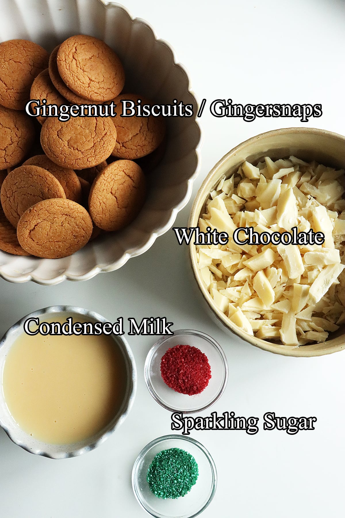Ingredients needed to make gingerbread truffles, including ginger snap cookies, condensed milk, white chocolate and red and green sparkling sugar