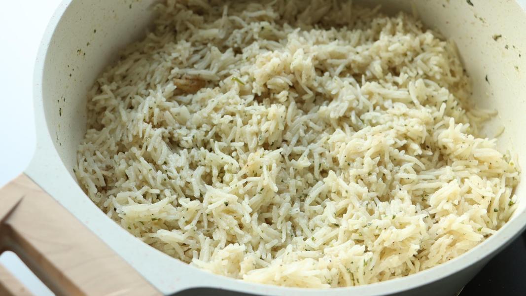 Turning off the heat after rice is tender and has absorbed all the liquid.